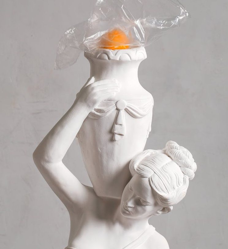 a photo of a woman statue